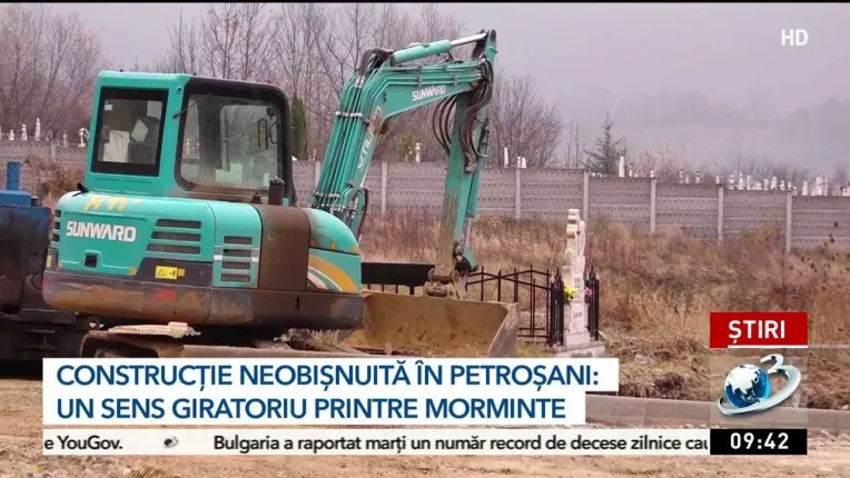 Constructie neobisnuita in Petrosani: un sens giratoriu printre morminte