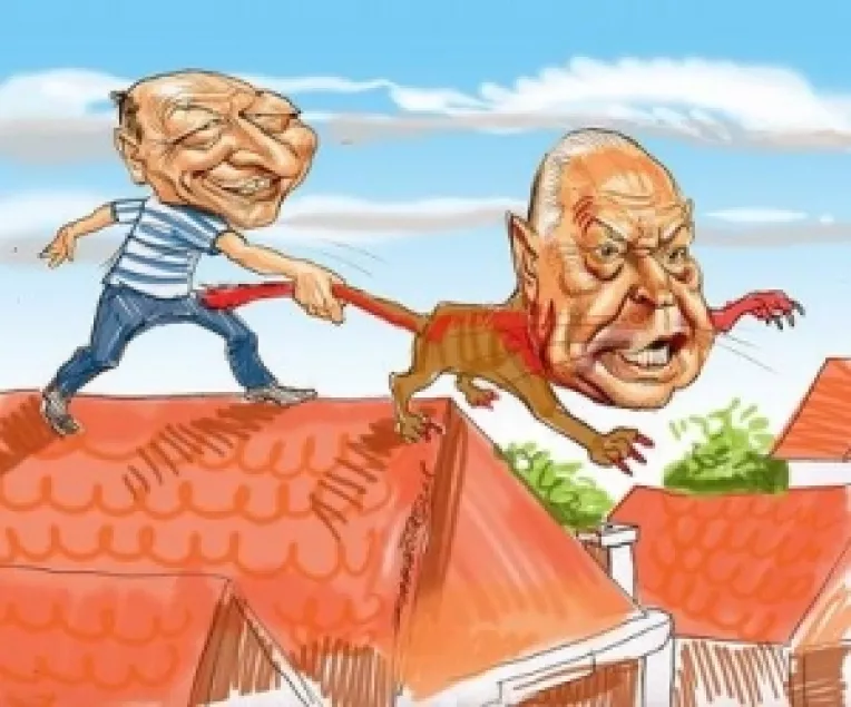 Premiu de 1000 de euro: Caricaturi si epigrame pe tema Basescu cu caciula in mana la Voiculescu
